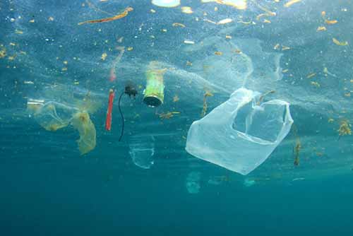 plastic waste floating in the ocean