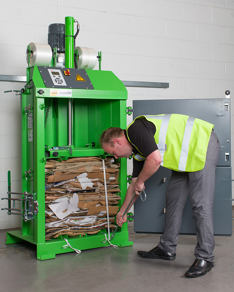 Engineer Servicing Baler